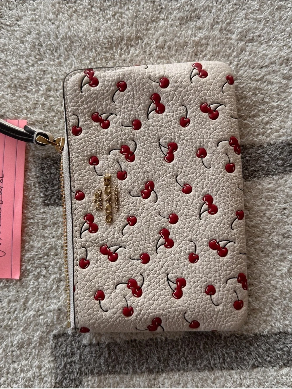 COACH Cream Leather Wristlet with Red Cherry Print